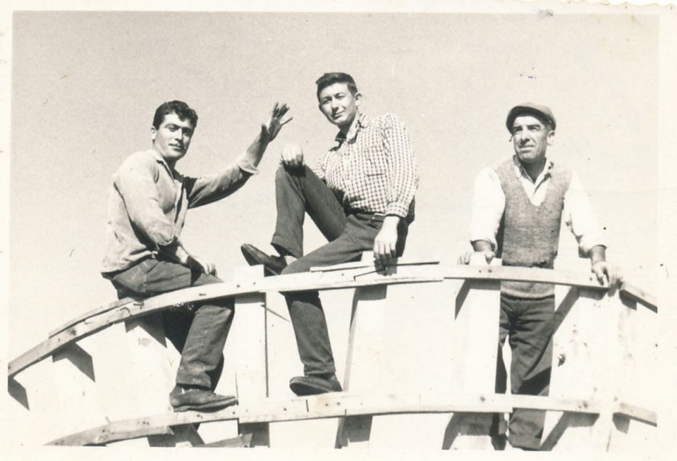 Three boatbuilders on a liberty type boat 